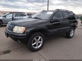 2002 Jeep Grand Cherokee — photo 2 of 12 | VIN 1J4GX58N42C257472