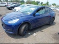 2021 Tesla Model Y — photo 2 of 14 | VIN 5YJYGDEE5MF179492