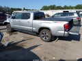 2018 Toyota Tacoma — photo 3 of 19 | VIN 3TMDZ5BN3JM050449