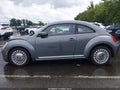 2014 Volkswagen Beetle — photo 14 of 17 | VIN 3VWJP7AT1EM630953