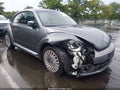 2014 Volkswagen Beetle — photo 1 of 17 | VIN 3VWJP7AT1EM630953