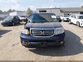 2014 Honda Pilot — photo 13 of 17 | VIN 5FNYF4H26EB015013