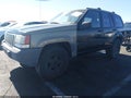 1998 Jeep Grand Cherokee — photo 2 of 12 | VIN 1J4GZ48Y7WC322996