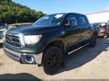 2013 Toyota Tundra — photo 2 of 16 | VIN 5TFDY5F14DX281045