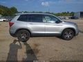 2021 Honda Passport — photo 13 of 16 | VIN 5FNYF8H59MB024787