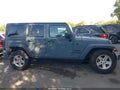 2015 Jeep Wrangler Unlimited — photo 13 of 16 | VIN 1C4BJWDGXFL723698