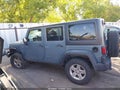 2015 Jeep Wrangler Unlimited — photo 14 of 16 | VIN 1C4BJWDGXFL723698