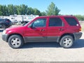 2004 Ford Escape — photo 16 of 17 | VIN 1FMYU93184KB19386