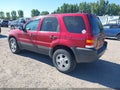 2004 Ford Escape — photo 3 of 17 | VIN 1FMYU93184KB19386