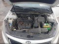 2015 Kia Optima — photo 10 of 12 | VIN 5XXGN4A79FG358692