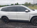 2021 Honda Pilot — photo 13 of 16 | VIN 5FNYF5H23MB039905