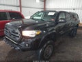 2016 Toyota Tacoma — photo 2 of 16 | VIN 3TMDZ5BNXGM006313