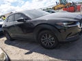 2023 Mazda CX-30 — photo 13 of 16 | VIN 3MVDMBAM6PM546956