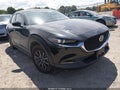 2023 Mazda CX-30 — photo 1 of 16 | VIN 3MVDMBAM6PM546956