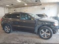 2014 Jeep Grand Cherokee — photo 13 of 17 | VIN 1C4RJFCG8EC247742