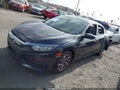 2016 Honda Civic — photo 2 of 19 | VIN 19XFC2F74GE202262