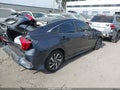 2016 Honda Civic — photo 4 of 19 | VIN 19XFC2F74GE202262