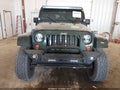2011 Jeep Wrangler Unlimited — photo 6 of 11 | VIN 1J4BA5H12BL576684