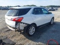 2018 Chevrolet Equinox — photo 4 of 17 | VIN 2GNAXJEV1J6315447