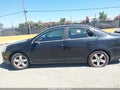 2009 Volkswagen Jetta — photo 14 of 16 | VIN 3VWRM71KX9M020381