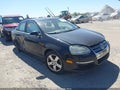 2009 Volkswagen Jetta — photo 1 of 16 | VIN 3VWRM71KX9M020381
