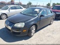 2009 Volkswagen Jetta — photo 2 of 16 | VIN 3VWRM71KX9M020381