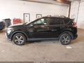 2018 Toyota RAV4 — photo 14 of 16 | VIN 2T3RFREV8JW732159