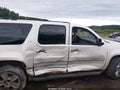 2010 Chevrolet Suburban 1500 — photo 12 of 15 | VIN 1GNUKKE33AR183179