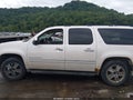 2010 Chevrolet Suburban 1500 — photo 13 of 15 | VIN 1GNUKKE33AR183179