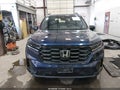 2023 Honda Pilot — photo 13 of 17 | VIN 5FNYG1H34PB046848