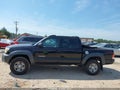 2015 Toyota Tacoma — photo 14 of 16 | VIN 5TFJX4GN1FX040726