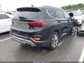 2019 Hyundai Santa Fe — photo 4 of 18 | VIN 5NMS3CAD2KH105046