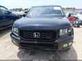 2014 Honda Ridgeline — photo 13 of 17 | VIN 5FPYK1F76EB010605