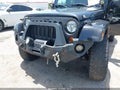 2010 Jeep Wrangler Unlimited — photo 6 of 16 | VIN 1J4HA5H15AL181732