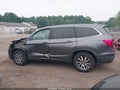 2020 Honda Pilot — photo 15 of 18 | VIN 5FNYF6H54LB050393