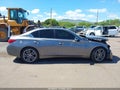 2015 Infiniti Q50 — photo 13 of 16 | VIN JN1BV7AP9FM349967