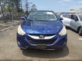 2011 Hyundai Tucson — photo 12 of 16 | VIN KM8JUCAC3BU142532