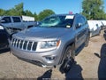 2014 Jeep Grand Cherokee — photo 2 of 17 | VIN 1C4RJFBT2EC247914