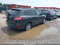 2012 Hyundai Santa Fe — photo 4 of 13 | VIN 5XYZKDAG1CG158737