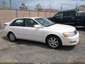 2000 Toyota Avalon — photo 13 of 16 | VIN 4T1BF28B7YU068322