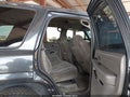 2004 Chevrolet Tahoe — photo 8 of 12 | VIN 1GNEC13T84R127063
