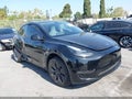 2024 Tesla Model Y — photo 1 of 16 | VIN 7SAYGDEE3RF004443