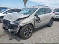 2018 Honda CR-V — photo 2 of 17 | VIN 5J6RW2H99JL004028