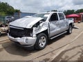 2018 Chevrolet Silverado 1500 — photo 2 of 14 | VIN 3GCUKREC7JG247886