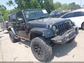 2009 Jeep Wrangler Unlimited — photo 1 of 16 | VIN 1J4GA59159L759656