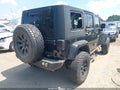 2009 Jeep Wrangler Unlimited — photo 4 of 16 | VIN 1J4GA59159L759656