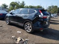 2018 Honda CR-V — photo 3 of 16 | VIN 2HKRW2H8XJH643049