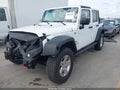 2018 Jeep Wrangler Unlimited — photo 2 of 16 | VIN 1C4BJWDG4JL887196