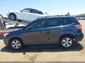 2015 Subaru Forester — photo 14 of 16 | VIN JF2SJABC1FH564903