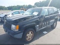 1997 Jeep Grand Cherokee — photo 2 of 11 | VIN 1J4GZ58S2VC712520